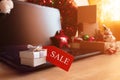 Christmas shopping online with laptop, x-mas sale at home in holiday decor Royalty Free Stock Photo