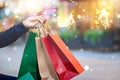 Christmas shopping-shopping bags in hand with snowflake Royalty Free Stock Photo