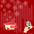 Christmas shopping snowflakes on red hands using smart phone