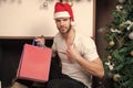 Christmas shopping time. i will be your santa. secret present from sexy man. xmas composition at home. macho man