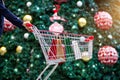 Christmas shopping-woman shopper,shopping bags in cart