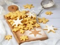 Christmas shortbread cookies in the form of snowflakes sprinkling sugar and cookie cutters. Xmas card concept Royalty Free Stock Photo