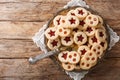 Christmas shortbread Linzer cookies with jam filling close-up on the table. Horizontal top view Royalty Free Stock Photo