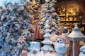 Christmas showcase with festive decorations, Christmas trees and owls