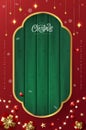 Christmas sign banner green wood frame with empty space and festive decoration on red background Royalty Free Stock Photo