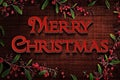 Christmas sign wood background with Holly border Royalty Free Stock Photo