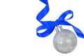 Christmas silver ball with blue ribbon Royalty Free Stock Photo