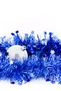 Christmas silver bals in blue tinsel Royalty Free Stock Photo