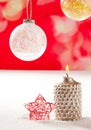 Christmas silver candle and red star on snow Royalty Free Stock Photo