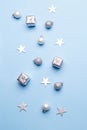 Christmas silver decorations on blue background Royalty Free Stock Photo