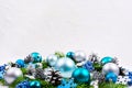 Christmas silver, pale blue, turquoise balls, glitter berries ba Royalty Free Stock Photo