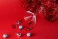 Christmas silver and red toys in a glass goblet Royalty Free Stock Photo