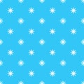 Christmas simple pattern. Seamless pattern with white snowflakes on a light blue background. Winter backdrop. Geometric festive Royalty Free Stock Photo