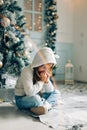 Christmas. Small girl asking santa for the gifts on christmas Royalty Free Stock Photo