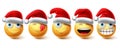 Christmas smiley vector set. Emoji xmas characters wearing santa red hat icon collection Royalty Free Stock Photo