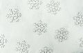 Christmas Snow Flakes Silhouette Pattern on Snowy White Background Powdered with Flour. New Year Holiday Greeting Card.Baking