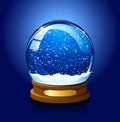 Christmas Snow globe on blue background Royalty Free Stock Photo