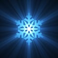 Christmas snowflake blue light flare Royalty Free Stock Photo