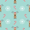 Christmas snowflake candy cane, deer wearing red santa hat. Seamless Pattern Decoration. Wrapping paper, textile template. Blue ba Royalty Free Stock Photo