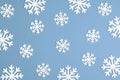 Christmas snowflake on pink background. Xmas minimal texture top view Royalty Free Stock Photo