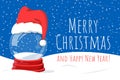 Christmas snowglobe with a Santa Claus hat Royalty Free Stock Photo