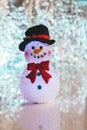 Christmas snowman decoration doll on top of a table Royalty Free Stock Photo