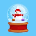 Christmas snowman holding present in globe glass for xmas, winter holiday decoration, white in hat and scarf Royalty Free Stock Photo