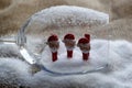 Christmas snowmen on clothespins, inside a glass goblet Royalty Free Stock Photo