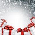 Christmas snowy background with gift boxes