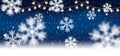 Christmas, Snowy background with light garlands Royalty Free Stock Photo