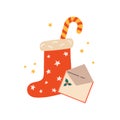 Christmas sock with sweets and a holiday envelope.