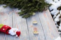 Christmas sock on wooden background. Toy and Christmas stocking, there is a branch of fir. Christmas and New Year decorations. Royalty Free Stock Photo