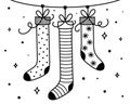 Christmas socks for gifts with simple ornates hanging on a rope. Xmas decoration. Winter object. Vector illustration