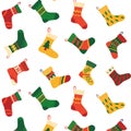 Christmas socks pattern. Seamless background with contemporary doodle celebration stocking for New Years presents Royalty Free Stock Photo