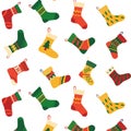 Christmas socks pattern. Seamless background with contemporary doodle celebration stocking for New Years presents. Winter texture Royalty Free Stock Photo