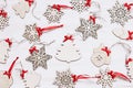 Christmas soft beige wooden snowflakes on a wood white background.