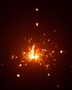 Christmas sparkler in haze with red light Royalty Free Stock Photo