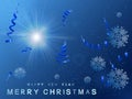 Christmas background blue sparkling with sun star. Royalty Free Stock Photo