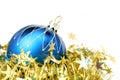 Christmas sphere of dark blue color and tinsel