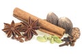 Christmas spices - anise stars, cardamom pods, nutmeg, cloves and cinnamon sticks on white background Royalty Free Stock Photo