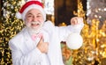 Christmas spirit. Mature man with white beard. Bearded grandfather senior man celebrate christmas. Kind grandpa with toy