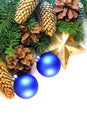 Christmas spruce twigs, cones, star and baubles Royalty Free Stock Photo