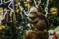 Christmas squirrel on blurry Christmas tree decoration background