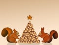 Christmas squirrels make tree with acorns