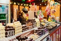 London, UK/Europe; 20/12/2019: Christmas stall with chocolates, candy and sweets at the Christmas market of Leicester Square,