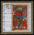 Christmas stamp printed in the Germany shows birth of Jesus Christ, adoration of the Shepherds