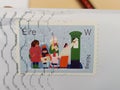 Christmas Stamp printed in Ireland and postmark. Posting Christma Mail