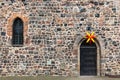 Christmas star above an old monastery door, Zinna, Germany Royalty Free Stock Photo