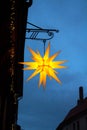 Christmas star at dusk on the background of the evening sky Royalty Free Stock Photo