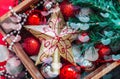 Christmas composition. Christmas star,red,silver and white decorations, fir tree branches. Christmas toys in wooden box. Royalty Free Stock Photo